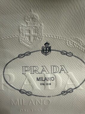 Prada Milano Embossed Logo on Cream Leather with Navy Print gift bag